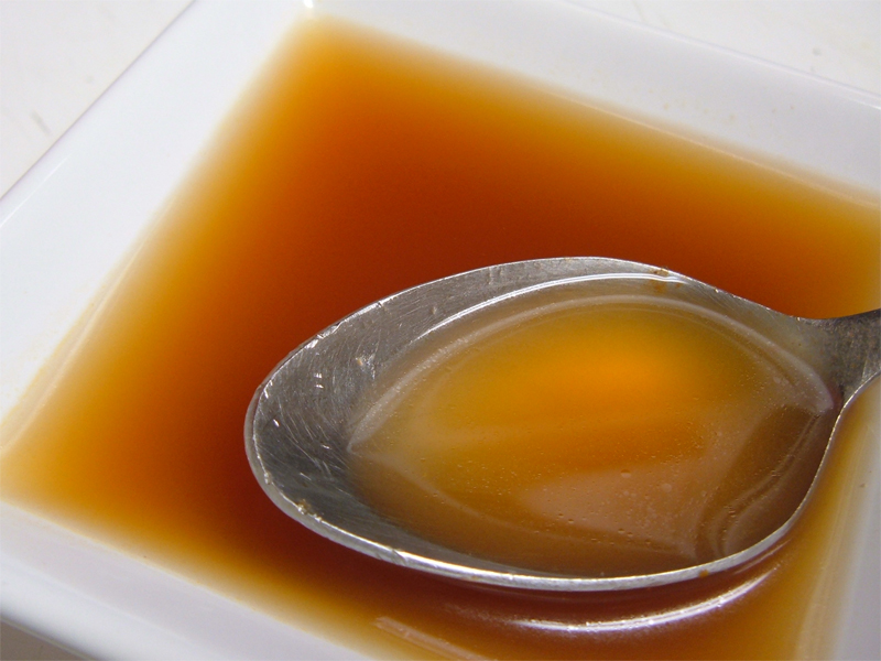 Beef Stock in a Dinged Up Spoon Beef Stock in a Dinged Up Spoon
