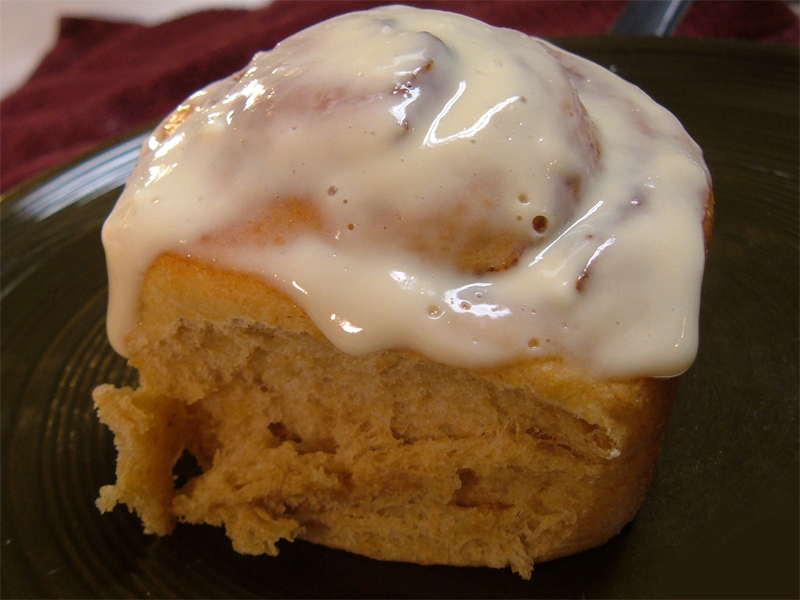 Whole Wheat Cinnamon Bun slathered in Thick Cream Cheese Glaze Whole Wheat Cinnamon Bun slathered in Thick Cream Cheese Glaze